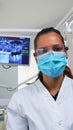 Patient pov in dental chair making periodic teeth check