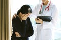 Patient receiving bad news, She is desperate and crying, Doctor support and comforting her patient