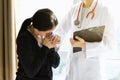 Patient receiving bad news, She is desperate and crying, Doctor support and comforting her patient