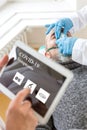 Patient with respirator, doctor is holding a tablet, corona virus concept or covid-19, sars-cov-2