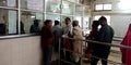 Patient rust on reception counter at indian government hospital