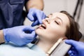 Patient`s teeth shade with samples for bleaching treatment. Royalty Free Stock Photo
