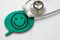 Patient satisfaction concept. Stethoscope and smiley face.