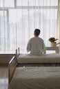 Patient Sitting In Hospital Bed