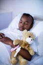 Patient sleeping with teddy bear Royalty Free Stock Photo