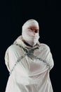 Patient in straitjacket and chains Royalty Free Stock Photo