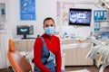 Patient with teeth health hygiene issues wearing face mask