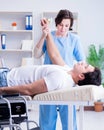 Patient undergoing rehabilitation recovery programme with doctor Royalty Free Stock Photo