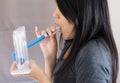 Patient using incentivespirometer or three balls for stimulate lung,Selective focus Royalty Free Stock Photo