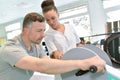 Patient using treadmill in hospital physiotherapy department