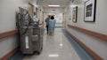 Patient walking in Cedars Sinai hospital corridor