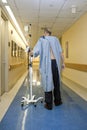 Patient walking down the hospital corridor