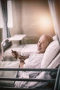 Patient watching television on bed Royalty Free Stock Photo