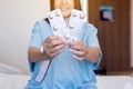 Patient women hands holding pills pack or capsules at hospital Royalty Free Stock Photo