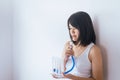 Patient woman using incentivespirometer or three balls for stimulate lung on white blackground Royalty Free Stock Photo