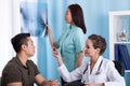 Patient with x-ray during medical appointment