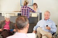 Patients In Doctor's Waiting Room Royalty Free Stock Photo