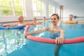 Patients during remobilization in a health center doing aquarobics Royalty Free Stock Photo