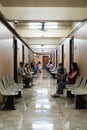 Patients on their cellphone while waiting their doctors Royalty Free Stock Photo