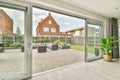 a patio area with a sliding glass door Royalty Free Stock Photo