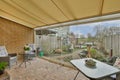 a patio with a brick floor and a glass door Royalty Free Stock Photo