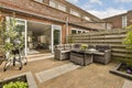 a patio with couches and a table in front Royalty Free Stock Photo