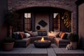 patio with firepit and comfortable seating for a cozy evening Royalty Free Stock Photo