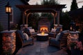 patio with firepit and comfortable seating for a cozy evening Royalty Free Stock Photo