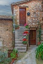 Patio with flowers in the old village France. Royalty Free Stock Photo