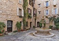 Patio with fountain in the old village Tourrettes-sur-Loup Royalty Free Stock Photo