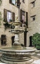 Patio with fountain in the old village at night, France. Royalty Free Stock Photo