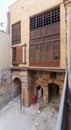 Patio of ottoman historic Waseela Hanem House with wooden oriel windows Royalty Free Stock Photo