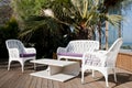 Patio outdoor furniture in garden Royalty Free Stock Photo
