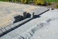 Patio pavement construction near the house. Laying paver bricks Royalty Free Stock Photo