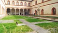 Italy, Milan: Patio`s in Sforza Castle with feral cat Royalty Free Stock Photo