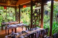 Vietnamese typical outdoor restaurant with laid tables in the green near Hue, Vietnam