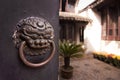 Patio of a traditional chinese house behing a closed door