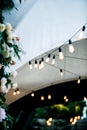 Patio wedding and holiday lights on street Royalty Free Stock Photo