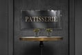 Patisserie sign board on wall