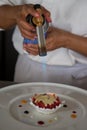 Patissier or chef burning creme brulee Royalty Free Stock Photo