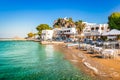 Patmos Island, Greece. Skala village and harbor view with beach at the port.