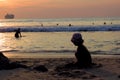 Patong, Phuket, Thailan - 11 December 2019 - blurred view sunset sky and sea, black silhouettes of floating people and childre