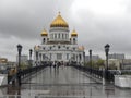 Patriarshy Bridge and the Cathedral of Christ the Saviour in Moscow in rainy weather.