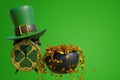 Patrick day. Alarm clock in a leprechaun hat cauldron iron pot full of gold coins on a green background. 3d rendering Royalty Free Stock Photo