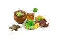 Patrick day coins clover meat snack stack of green liquor a glass of scotch whiskey with ice Royalty Free Stock Photo