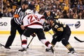 Patrick Elias and Patrice Bergeron faceoff Royalty Free Stock Photo