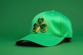 Patrick hat in vibrant green with embroidered clover leaves, isolated against a monochromatic green background
