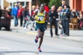 Patrick Korir from Kenya later came in as number seven in ASICS