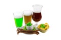 Patrick`s Day - three glasses of beer bamboo unfiltered stout with a variety of snacks and biscuit clover with green mastic