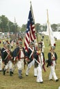 Patriot soldiers march to Surrender Field as part of the 225th Anniversary of the Victory at Yorktown, a reenactment of the siege Royalty Free Stock Photo